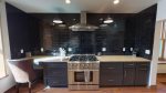Large open kitchen with new chef grade appliances